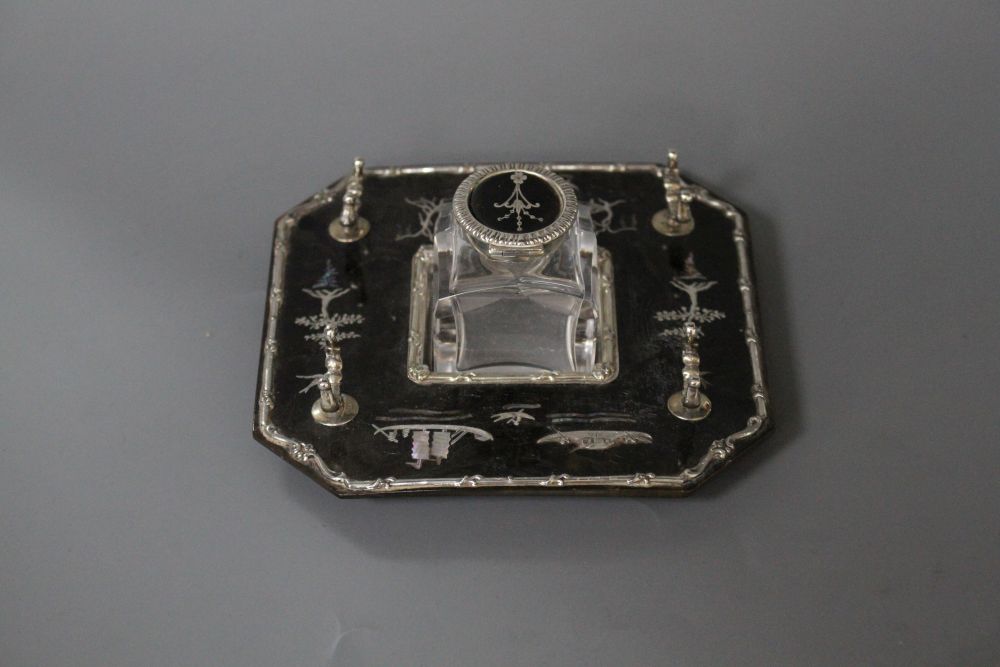 An Edwardian silver, mother of pearl and tortoiseshell chinoiserie inkstandish, retailed by Goldsmiths & Silversmiths Co Ltd,